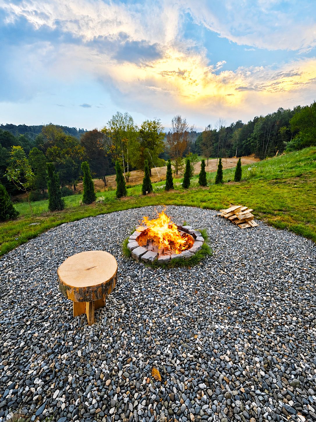 The outdoor stone fire pit, with firewood included for every stay