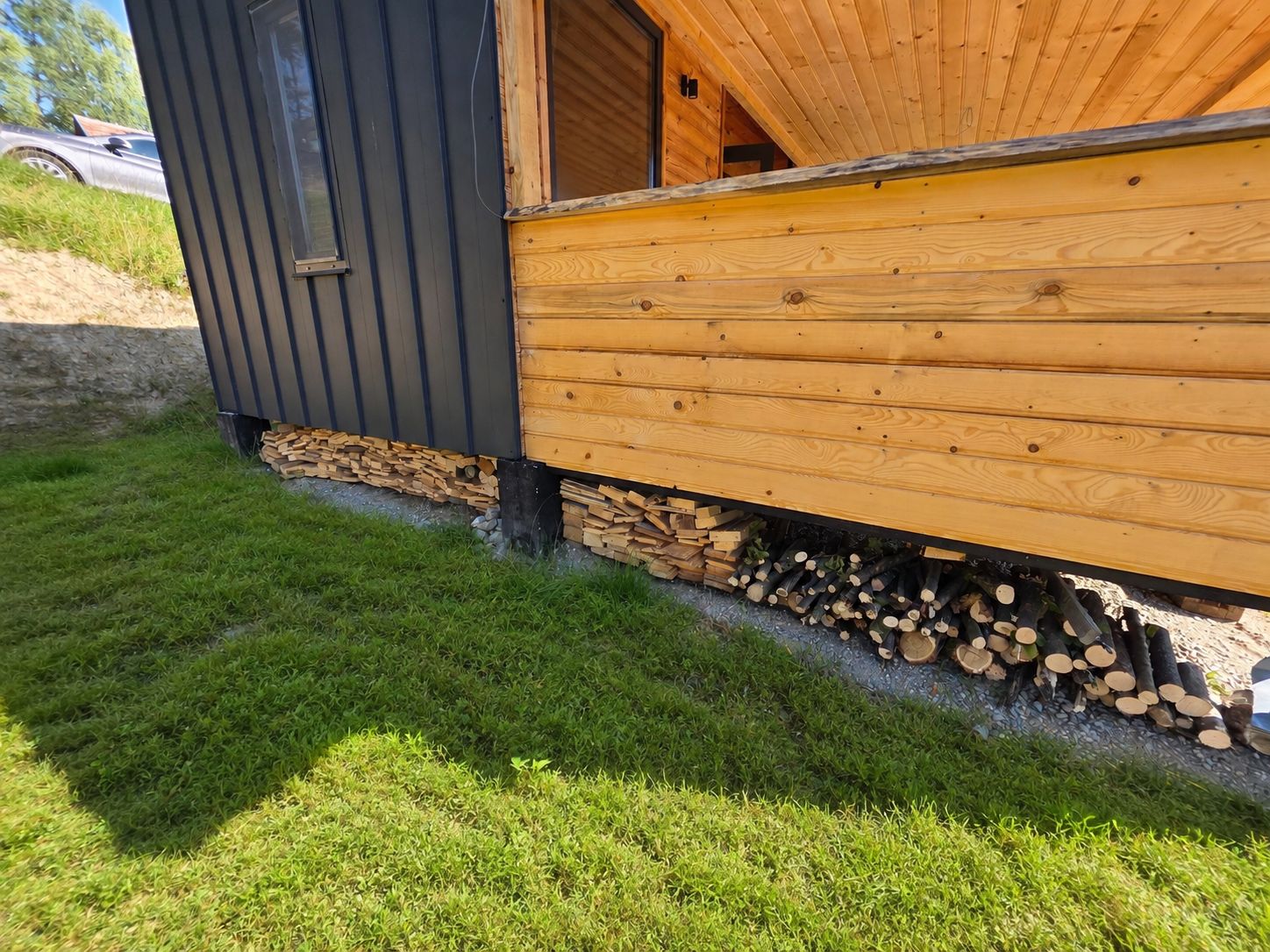 Firewood stacked and ready under the cabin for every stay