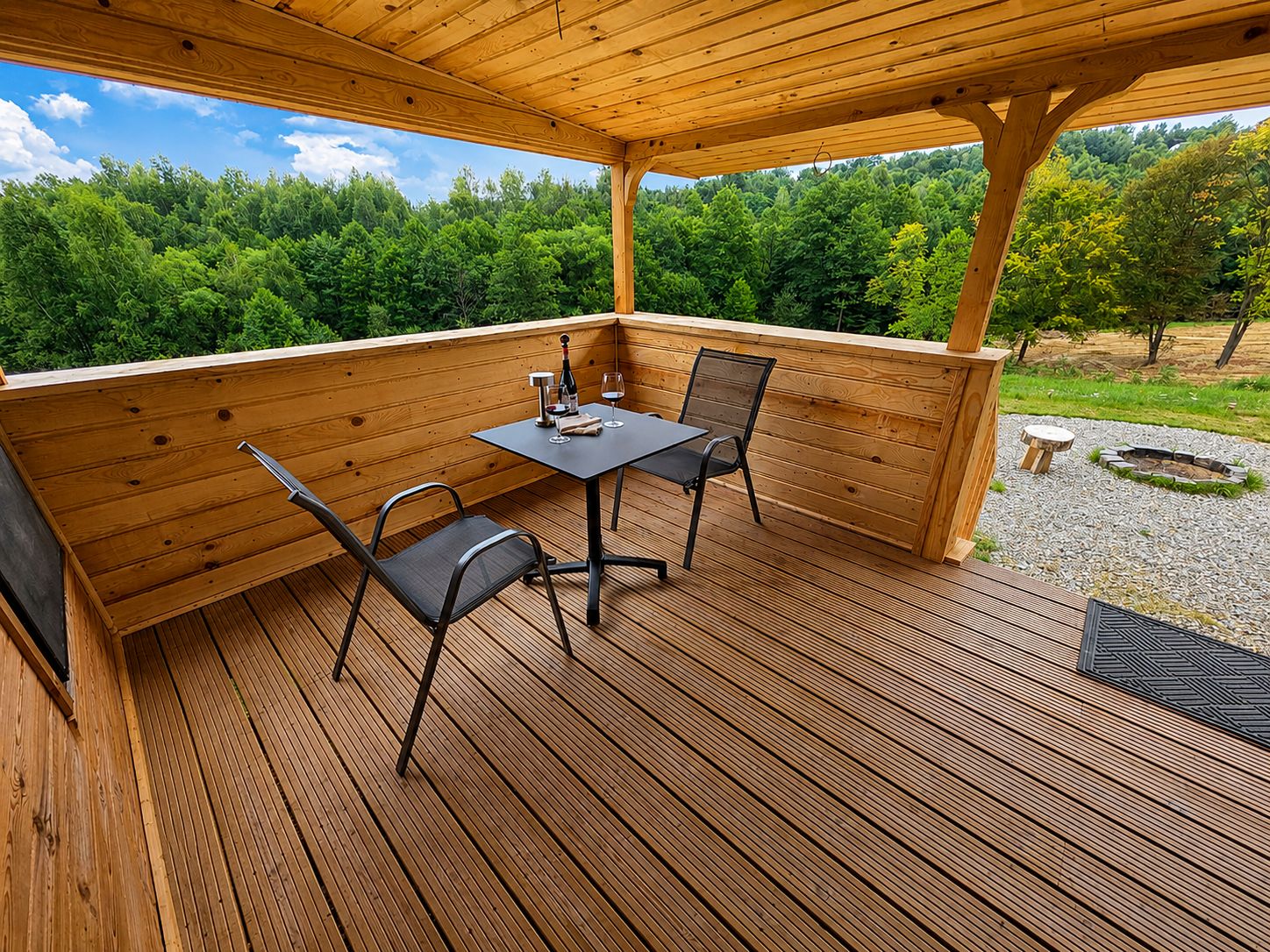Evenings on the terrace, table set and the fire pit waiting below